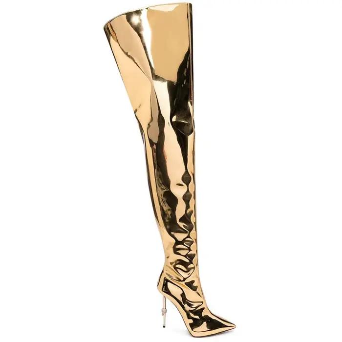 Bottes en cuir verni doré, cuissardes à bout pointu, talons hauts au dessus du genou, bottes de chev
