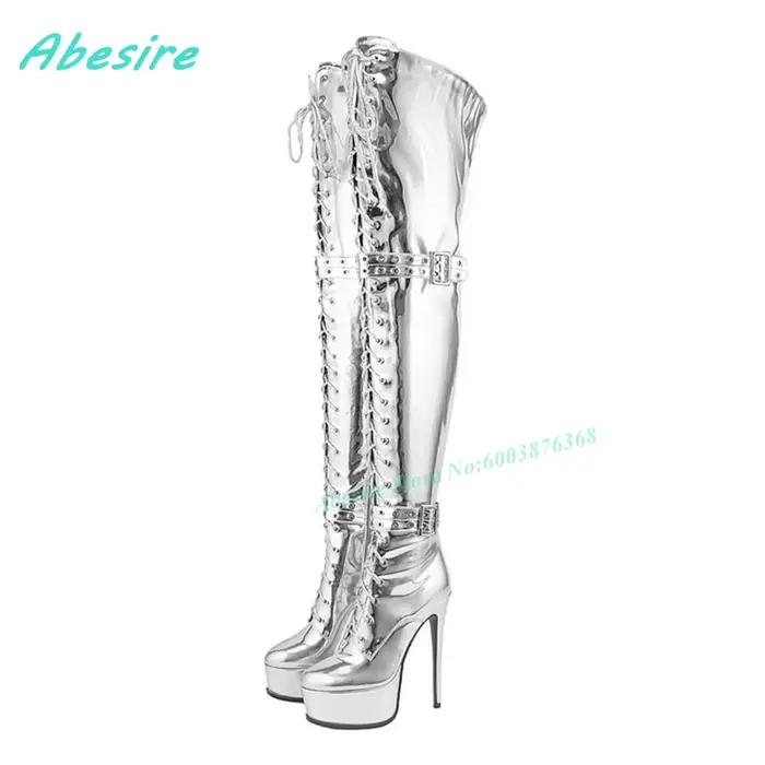 Bottes noires en cuir verni au-dessus du genou, à lacets, avec fermeture éclair latérale, plateforme
