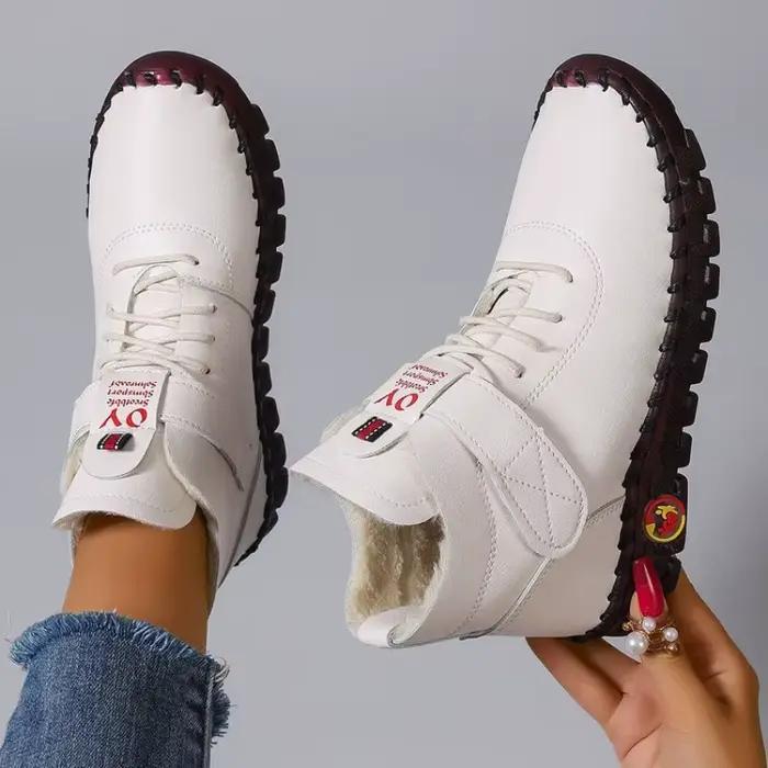 Bottes courtes en cuir et fourrure épaisse pour femme