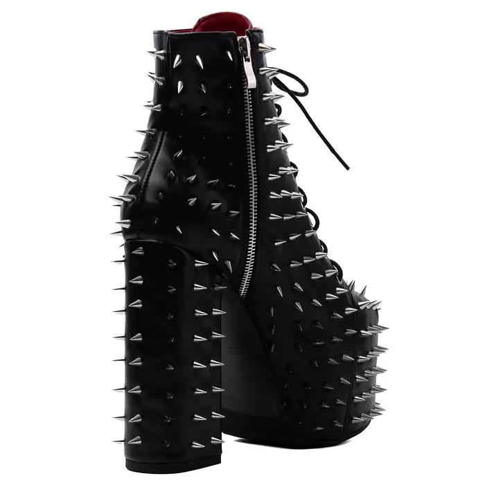 Bottines noires en cuir à rivets