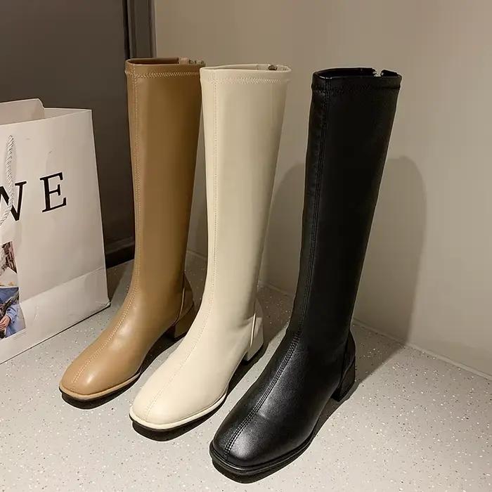 Bottes longues noires à talons hauts pour femmes