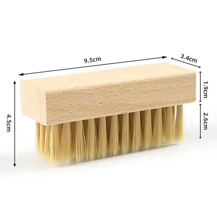 Brosse de nettoyage efficace pour bottes en poils de porc avec maintien en bois.