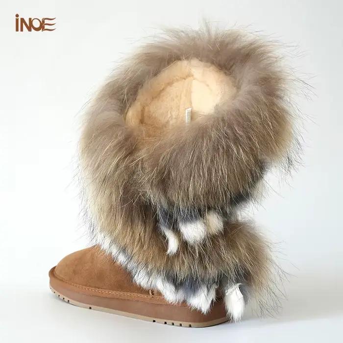 Bottes de neige en fourrure de raton laveur et peau de mouton lainée pour femmes, confortables et résistantes à la neige, avec pompons en fourrure de lapin, hauteur au-dessus du genou, talons plats, pour l'hiver, occasions spéciales