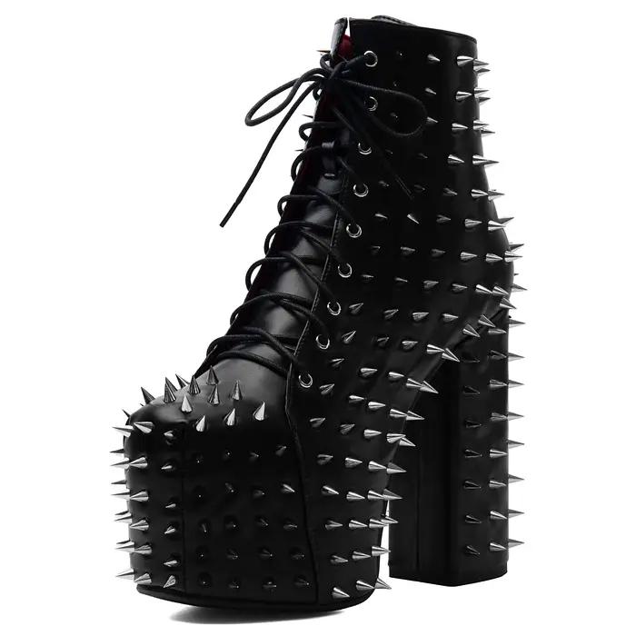 Bottines noires en cuir à rivets