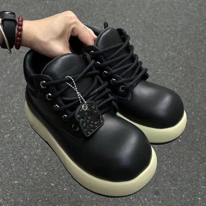 2025 laid mignon jaune grosse tête femmes bottes en cuir véritable à lacets plate-forme bottes décon