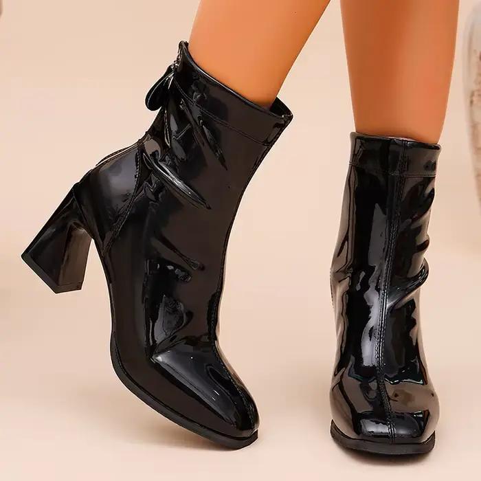 Bottines à talons hauts en cuir verni noir pour femme